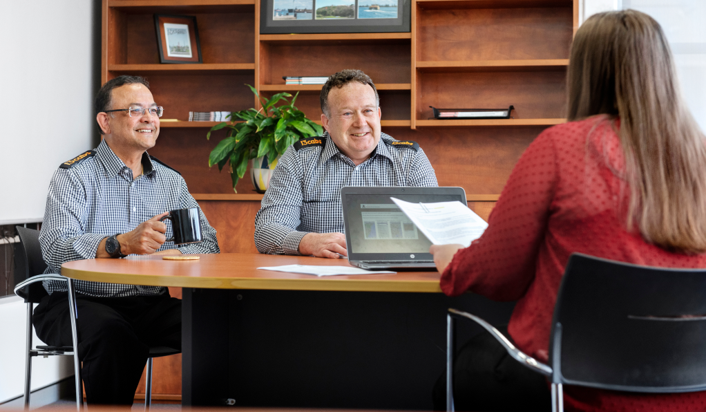 two taxi drivers in office